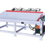 Hydraulic door assembly machine