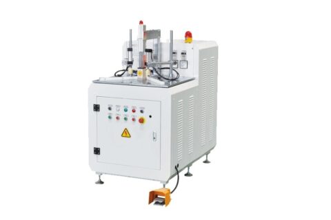 Wood corner jointing machine with high frequency heating