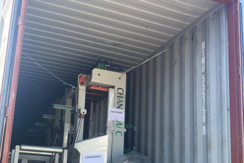 Vertical glulam press container loading